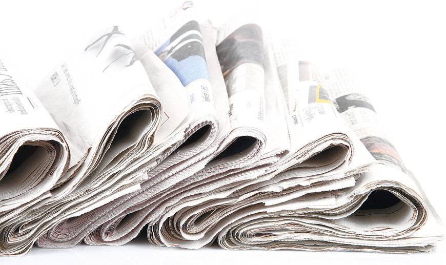 Immagine rappresentante una pila di giornali